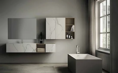 Idea Group | Composizione Dogma 01 composta da mobile base lavabo in gres con elemento a giorno in rovere naturale. Mobile alto a 2 ante in gres statuario con elemento a giorno in rovere naturale e specchiera rettangolare.