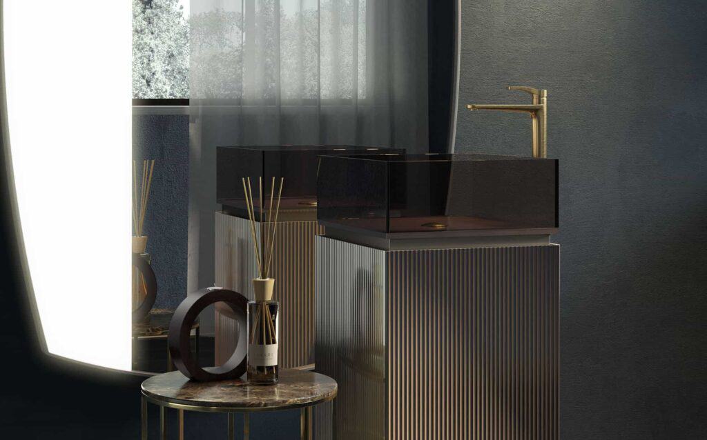 la collezione Plissé dà vita ad una serie di totem lavabo contenitivi realizzati totalmente in vetro B2 Flutes Bronzo ondulato per il rivestimento e smaltato lucido per il lavabo con particolari in metallo.